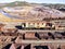 Aerial drone view of an old and rusty mining train used for transportation