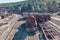 Aerial drone view of an old and rusty steam mining train used for transportation of the copper of Corta Atalaya mining exploitatio