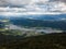 Aerial drone view on Ossiacher Lake in Carinthia, Austria on a summer day with great cloudscape and Lake Woerthersee in