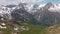 Aerial drone view point of Grossglockner Hochalpenstrasse - Scenic Alpine curve road in Austria mountains, sunny summer day, blue