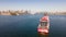 Aerial drone view of Resilient Lady Virgin Voyages cruise ship at Athol Bay in Sydney Harbour, NSW, showing Sydney City