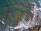 Aerial drone view of the rocks of Cabo Huertas beach in Alicante, located in the Valencian Community, Spain