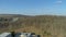 Aerial drone view rotating from left to right over the public school of Oka region