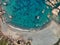 Aerial  drone view of scenic amazing  beach cove, rocks cliff a boat and sandy beach - cala tinnari, costa paradiso - sardinia ita