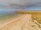 Aerial drone view on Silver strand beach in county Mayo, Ireland. Long sandy beach with beautiful views and peaceful atmosphere.