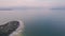 Aerial drone view of the Sirmione peninsula on Lake Garda, Italy.