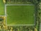 Aerial drone view on a small soccer pitch. Football training ground from above view