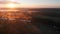 Aerial drone view of sunrise over misty river