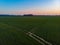 Aerial drone view to long paths between huge fields