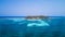 Aerial drone view of Tobacco Caye small Caribbean island in Belize Barrier Reef