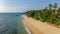 Aerial drone view of tropical beach from above, sea, sand and palm trees island beach landscape, Lanta, Thailand