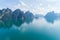 Aerial drone view of tropical Mountain peak in Thailand Beautiful archipelago islands Thailand Scenic mountains on the lake in