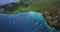 Aerial Drone view of a Tropical paradise beach surrounded by sea and jungle in the Caribbean island of St Lucia