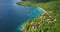 Aerial Drone view of a Tropical paradise beach surrounded by sea and jungle in the Caribbean island of St Lucia