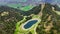 Aerial drone view turquoise lake in mountains Bavarian Alps. Ski resort in summer.