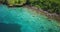 Aerial drone view of two people snorkelling in the tropical waters of the Caribbean sea