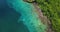 Aerial drone view of two people snorkelling in the tropical waters of the Caribbean sea