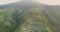 aerial drone view of a vegetable plantation on the slopes of Mount Sumbing