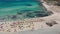 Aerial drone view video of iconic Balos beach and lagoon near Gramvousa island with turquoise clear sea and pure white sand, Crete