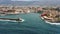 Aerial drone view video of iconic and picturesque Venetian old port of Chania with famous lighthouse and traditional character,