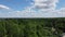 Aerial drone view of village and forests with tower antennas Telecommunication cell phone, radio transmitters of