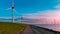 Aerial drone view wind turbine park ofsshore wind farm in the Netherlands on sunset