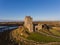 Aerial Dunguaire Castle Evening Sunset, near Kinvarra in County Galway, Ireland - Wild Atlantic Way Route. Famous irish castle.