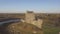 Aerial Dunguaire Castle Evening Sunset, near Kinvarra in County Galway, Ireland - Wild Atlantic Way Route. Famous public tourist a