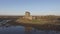 Aerial Dunguaire Castle Evening Sunset, near Kinvarra in County Galway, Ireland - Wild Atlantic Way Route. Famous public tourist a