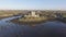 Aerial Dunguaire Castle Evening Sunset, near Kinvarra in County Galway, Ireland - Wild Atlantic Way Route. Famous public tourist a