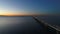 Aerial - Dusk of a bridge over the sea and Tokyo Bay