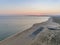 Aerial dusk seascape of Salgados beach in Albufeira, Algarve.