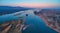 Aerial, east view of Zambezi river during sunset. View on african wilderness, mountains and huge river Zambezi from above. Border