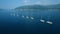 Aerial. Eight yachts lined up on Adriatic sea