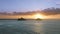 Aerial of epic sunrise above Na Mokulua islands silhouettes blue Pacific Ocean