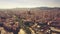 Aerial establishing shot of Barcelona involving famous Basilica de la Sagrada Familia with city geotag, Spain