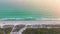 Aerial evening seascape with Blind Pass sandy beach on Manasota Key, USA. Many tourists enjoying summer vacation time