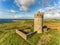 Aerial Famous Irish Tourist Attraction In Doolin, County Clare, Ireland. Doonagore Castle is a round 16th-century tower Castle.