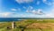 Aerial Famous Irish Tourist Attraction In Doolin, County Clare, Ireland. Doonagore Castle is a round 16th-century tower Castle.