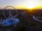 Aerial ferrris wheel in sunset