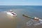 Aerial from the ferry to Ameland and a freighter on the Wadden Sea in the Netherlands