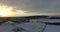 Aerial: Fields during winter covered with snow near Edinburgh, Scotland