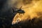 Aerial firefighting Helicopter releases water to combat a fierce wildfire