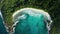 Aerial flat slider over blue lagoon Anse Cocos beach, La Digue island