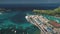 Aerial flight above ocean harbor, port, pier