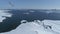 Aerial flight over Antarctica snow land, ocean.