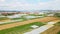 Aerial Flight over greenhouses and greenhouse vegetable growing in agricultural greenhouses