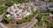 Aerial. Flight Over Houses on Hill