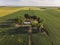 Aerial flight over Ranch in late summer sunset in agricultural fields, Vojvodina landscape