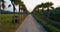 Aerial flight over rural road at sunset